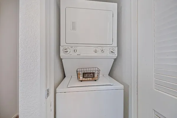 a bathroom with a sink toilet and a mirror