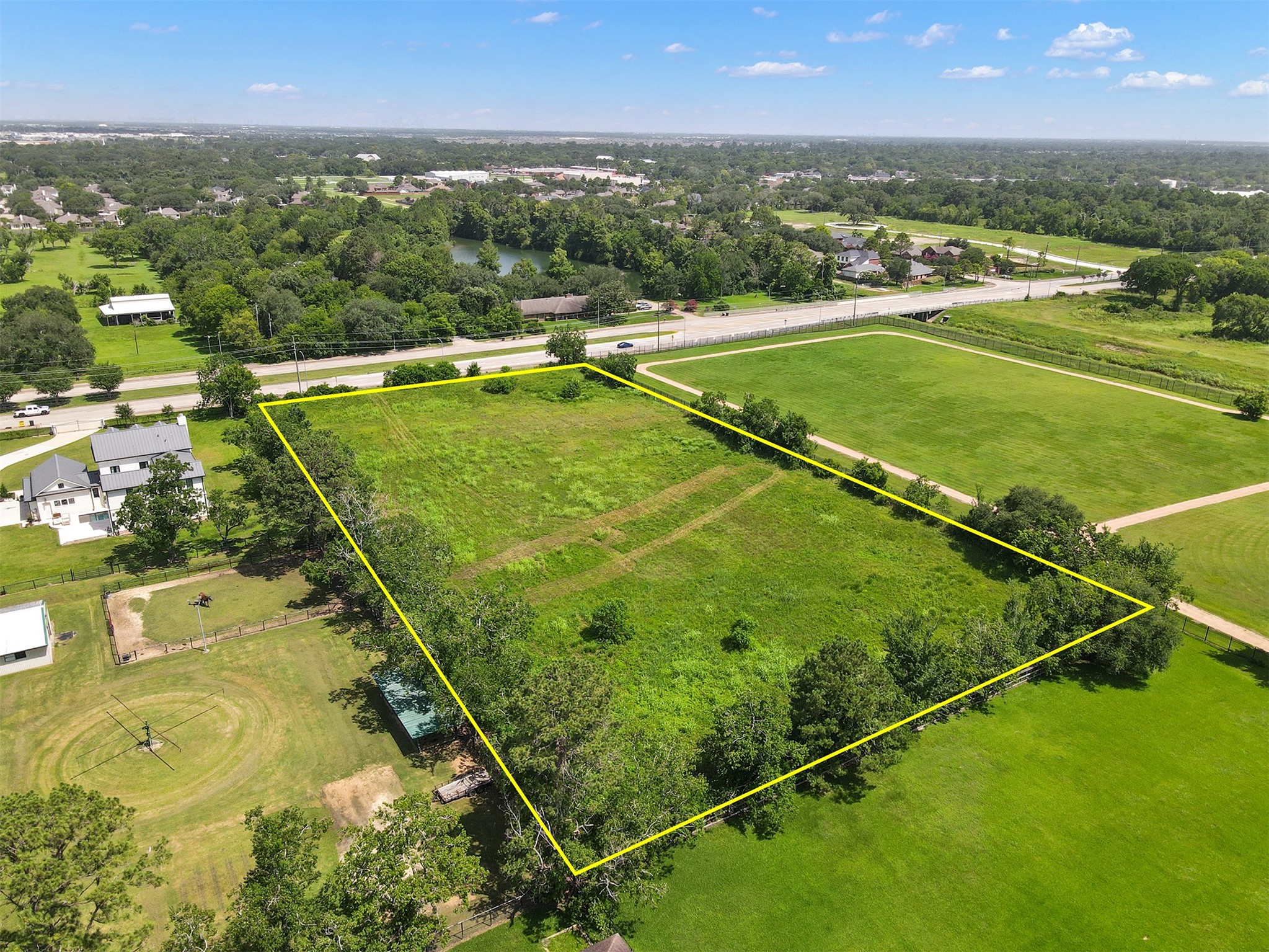 3521 Dixie Farm Road Pearland, TX 77581 - Photo 2 of 4 a view of a tennis court