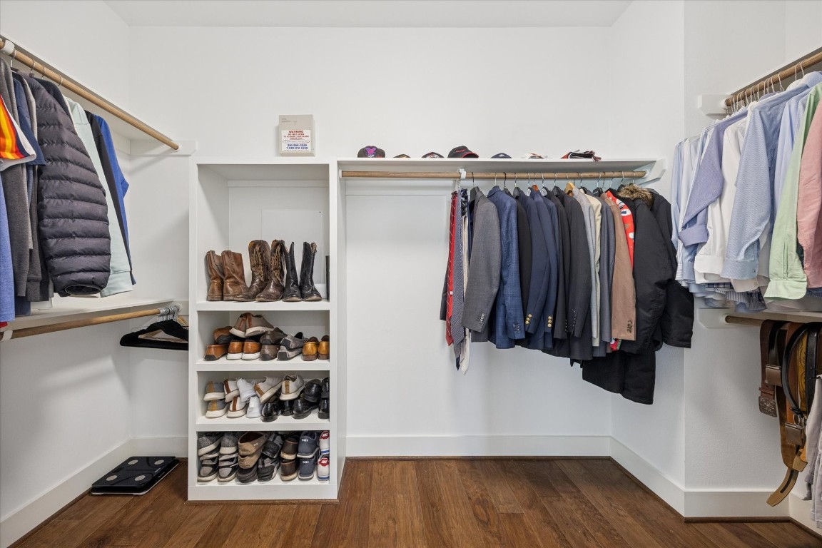 920 West 25th Street, Unit B Houston, TX 77008 - Photo 22 of 35 a view of walk in closet with clothes and shoes