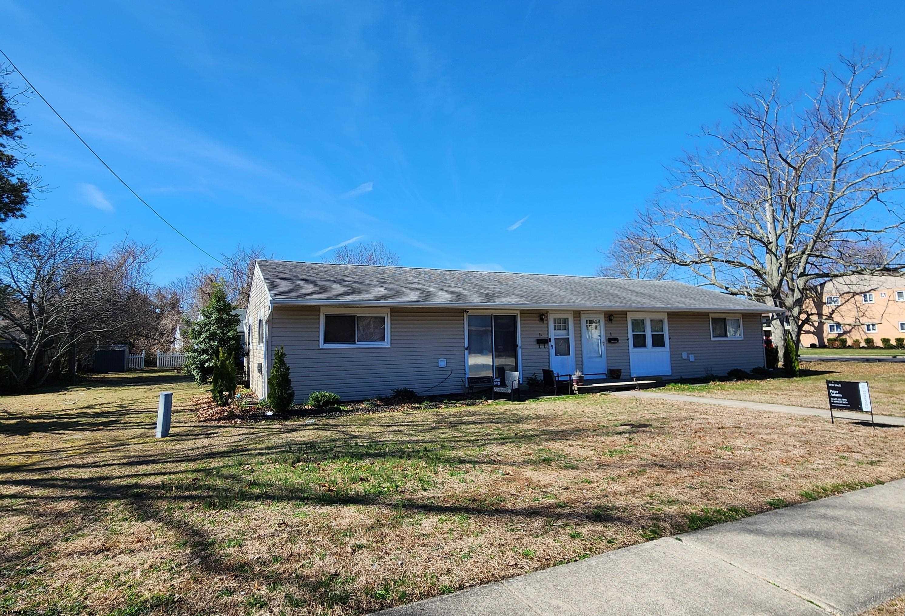 1 Hamilton Drive Somers Point, NJ 08244 - Photo 1 of 5 a view of a house with a yard