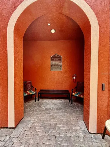 a view of swimming pool with a garden and seating area