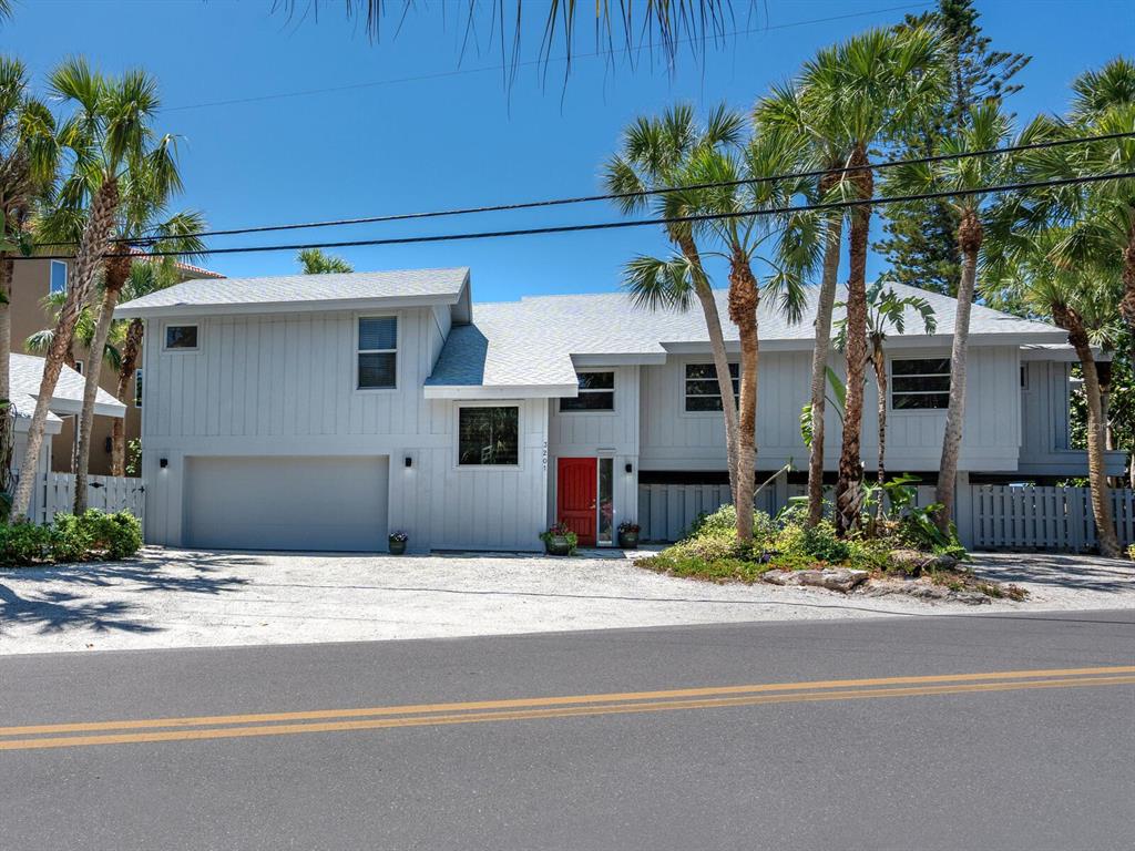 3201 Casey Key Road Nokomis, FL 34275 - Photo 68 of 98 a view of street along with house and trees