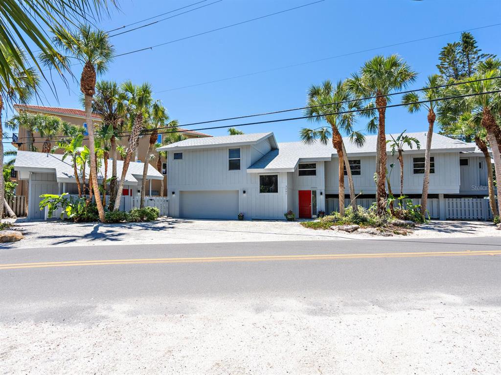 3201 Casey Key Road Nokomis, FL 34275 - Photo 74 of 98 front view of a building with a street