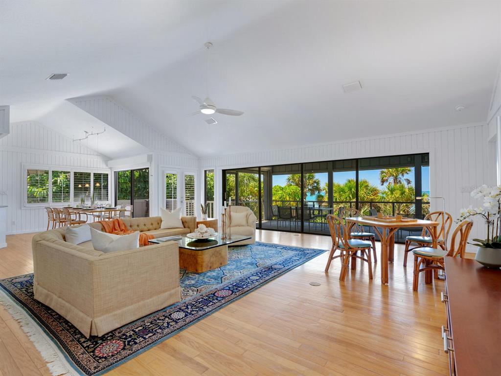 3201 Casey Key Road Nokomis, FL 34275 - Photo 8 of 98 a living room with furniture and a large window