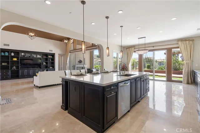 a view of a kitchen with a sink