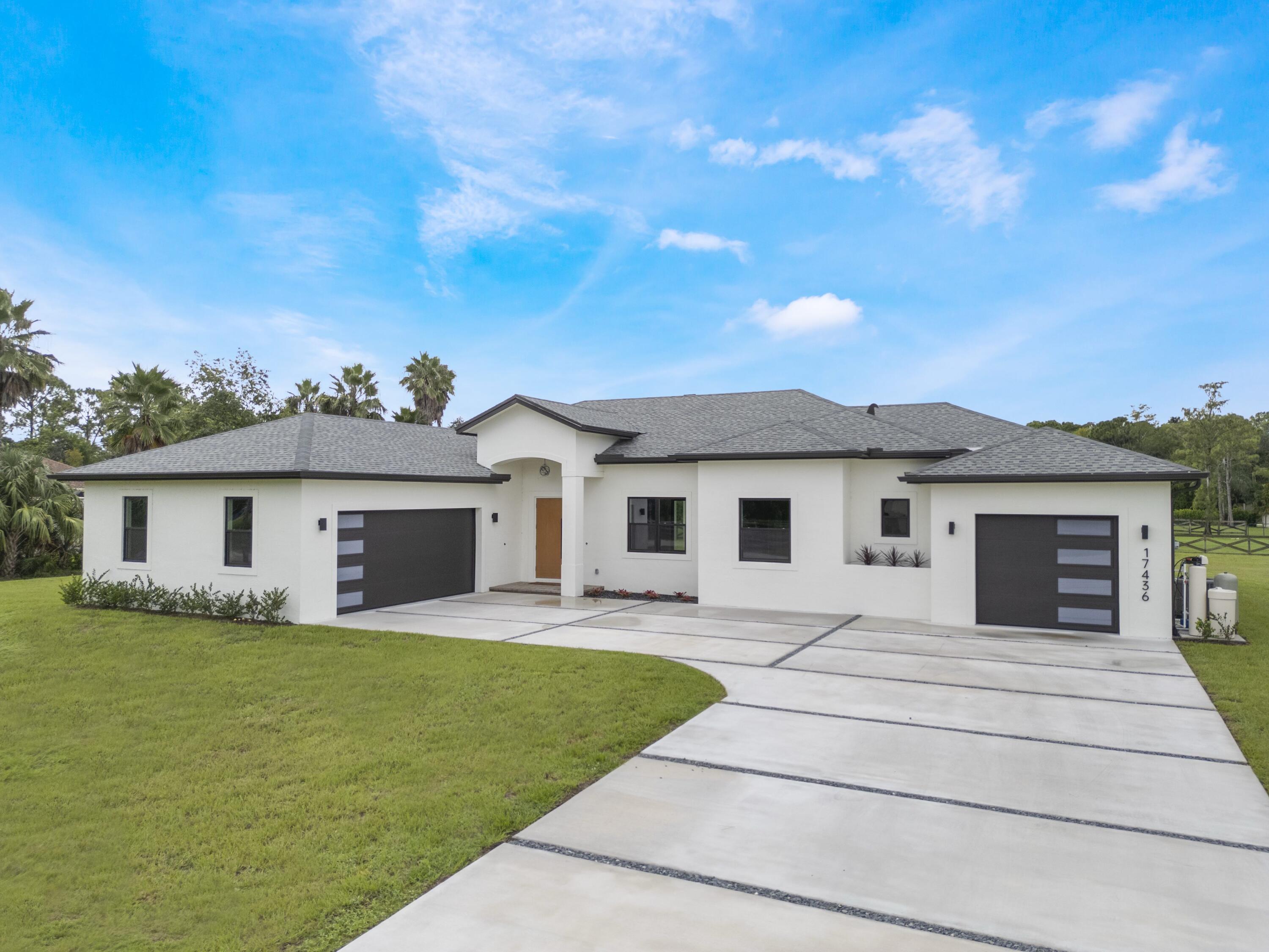 17436 71st Lane North Loxahatchee, FL 33470 - Photo 3 of 50 a view of house with a outdoor space
