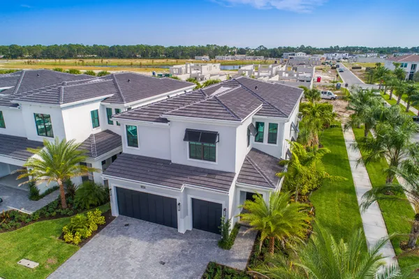 a aerial view of a house with a ocean view