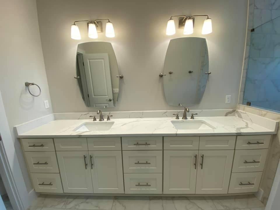 400 Fanny Ann Way Freeport, FL 32439 - Photo 10 of 20 a bathroom with double vanity sinks and a mirror