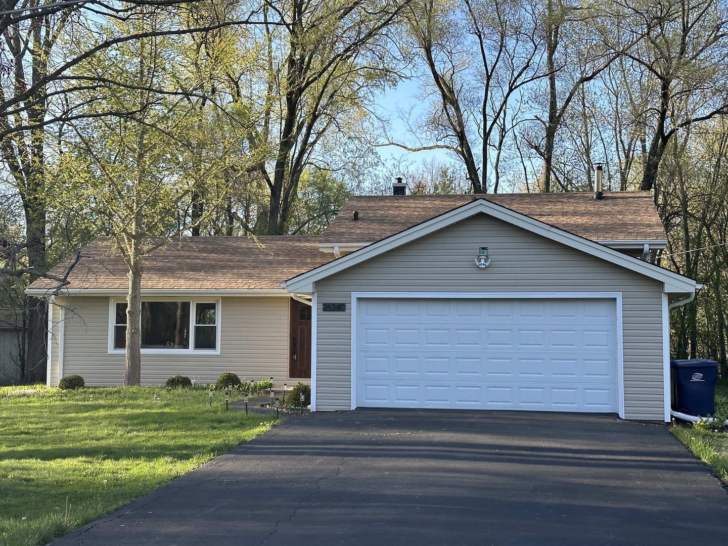 a small white house with a outdoor space