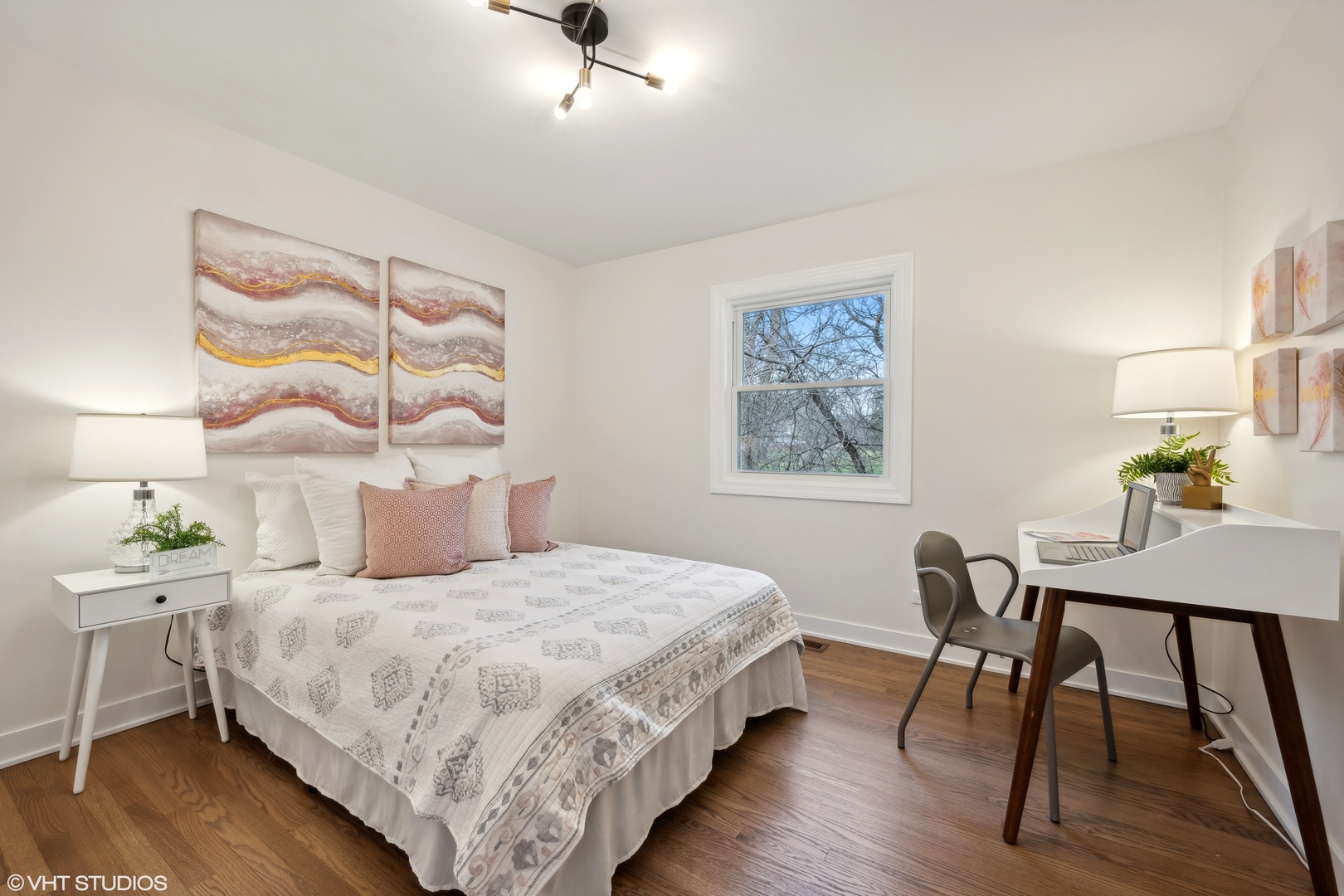 26340 West Merton Road Barrington, IL 60010 - Photo 12 of 22 a bedroom with a bed a table and painting on the wall