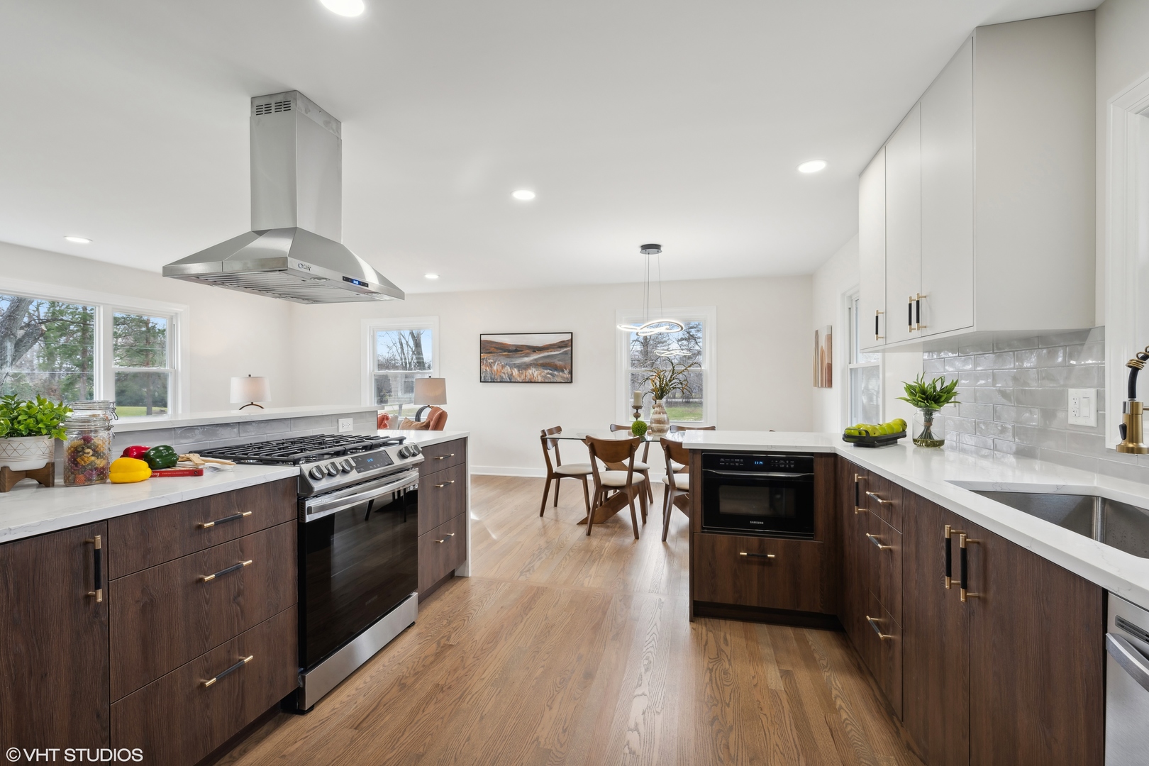 26340 West Merton Road Barrington, IL 60010 - Photo 6 of 22 a kitchen with stainless steel appliances a stove a sink dishwasher and a refrigerator