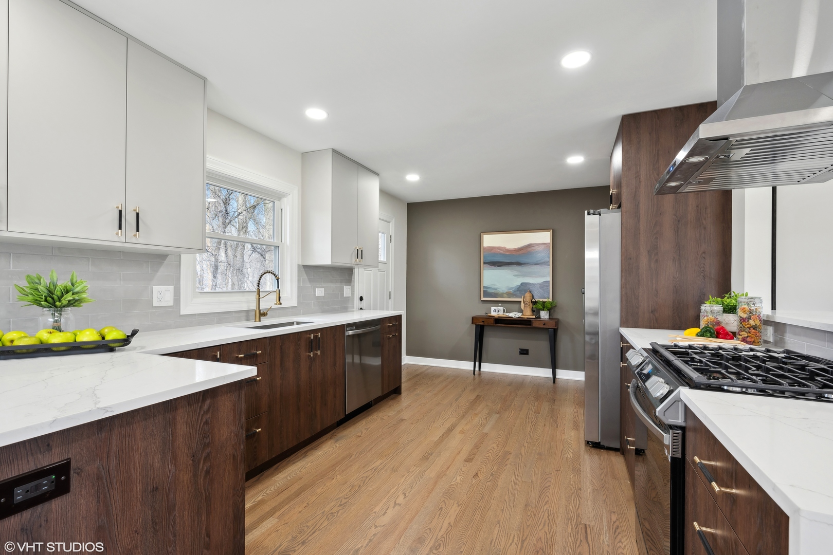 26340 West Merton Road Barrington, IL 60010 - Photo 7 of 22 a kitchen with a sink stove and cabinets