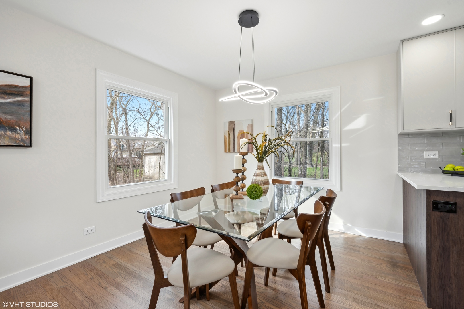 26340 West Merton Road Barrington, IL 60010 - Photo 10 of 22 a view of a dining room with furniture window and wooden floor