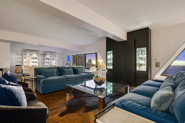 a living room with furniture or couch and a window