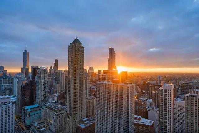 a view of a city with tall buildings