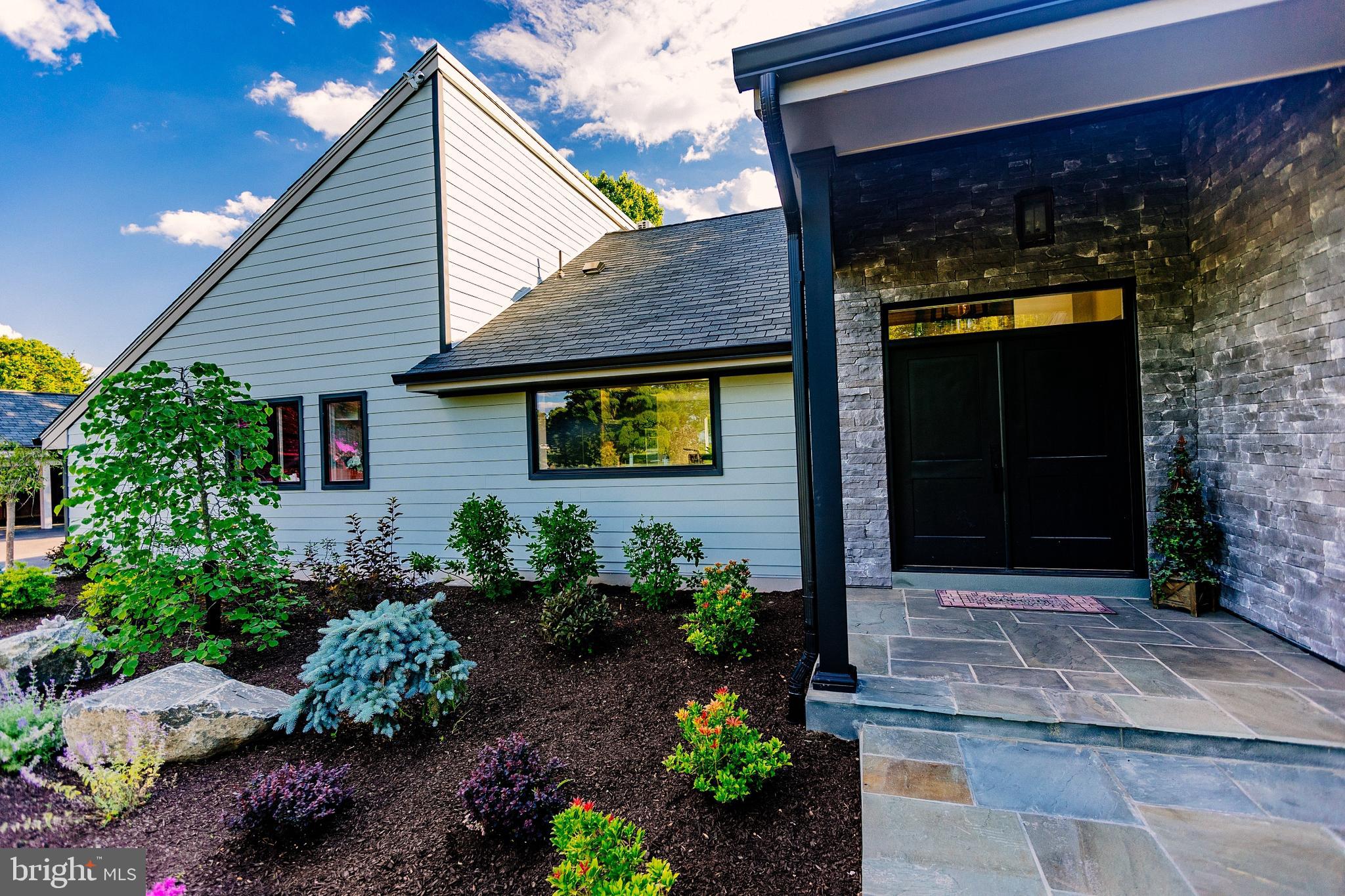 1091 Highland Road Newtown, PA 18940 - Photo 3 of 128 a house view with a garden space