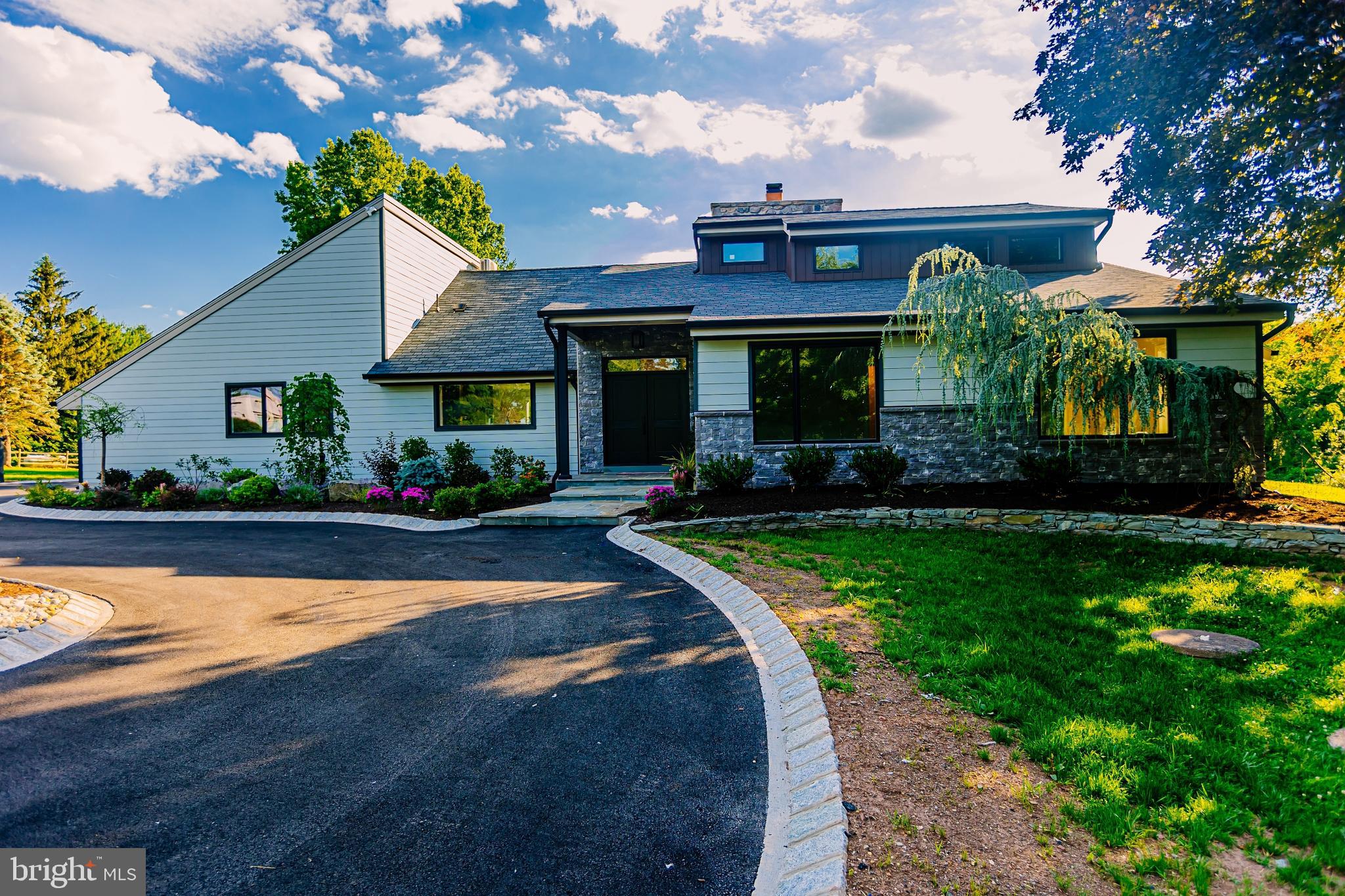 1091 Highland Road Newtown, PA 18940 - Photo 23 of 128 a front view of a house with swimming pool having outdoor seating