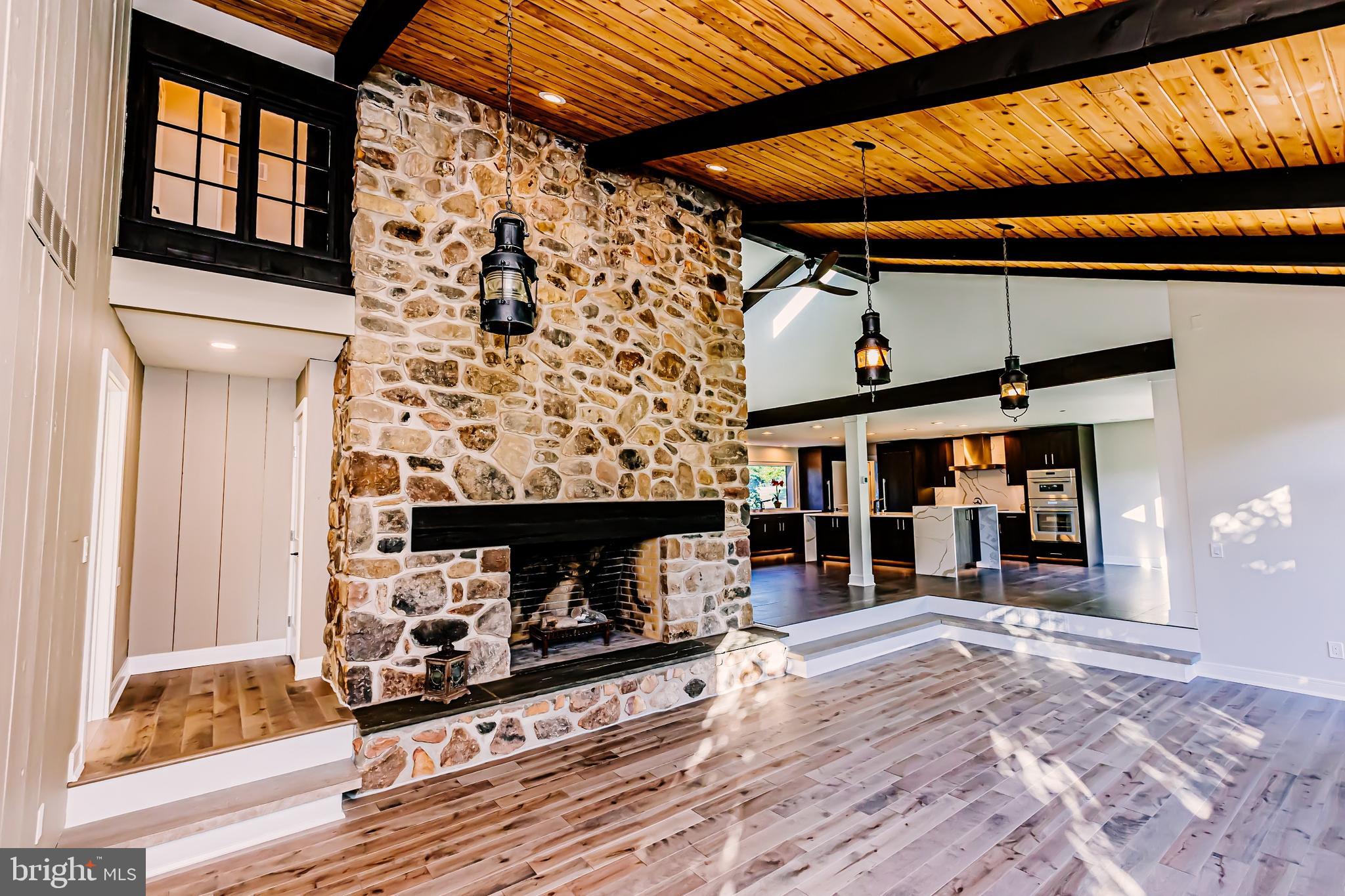 1091 Highland Road Newtown, PA 18940 - Photo 28 of 128 Dramatic family room with original stone fireplace