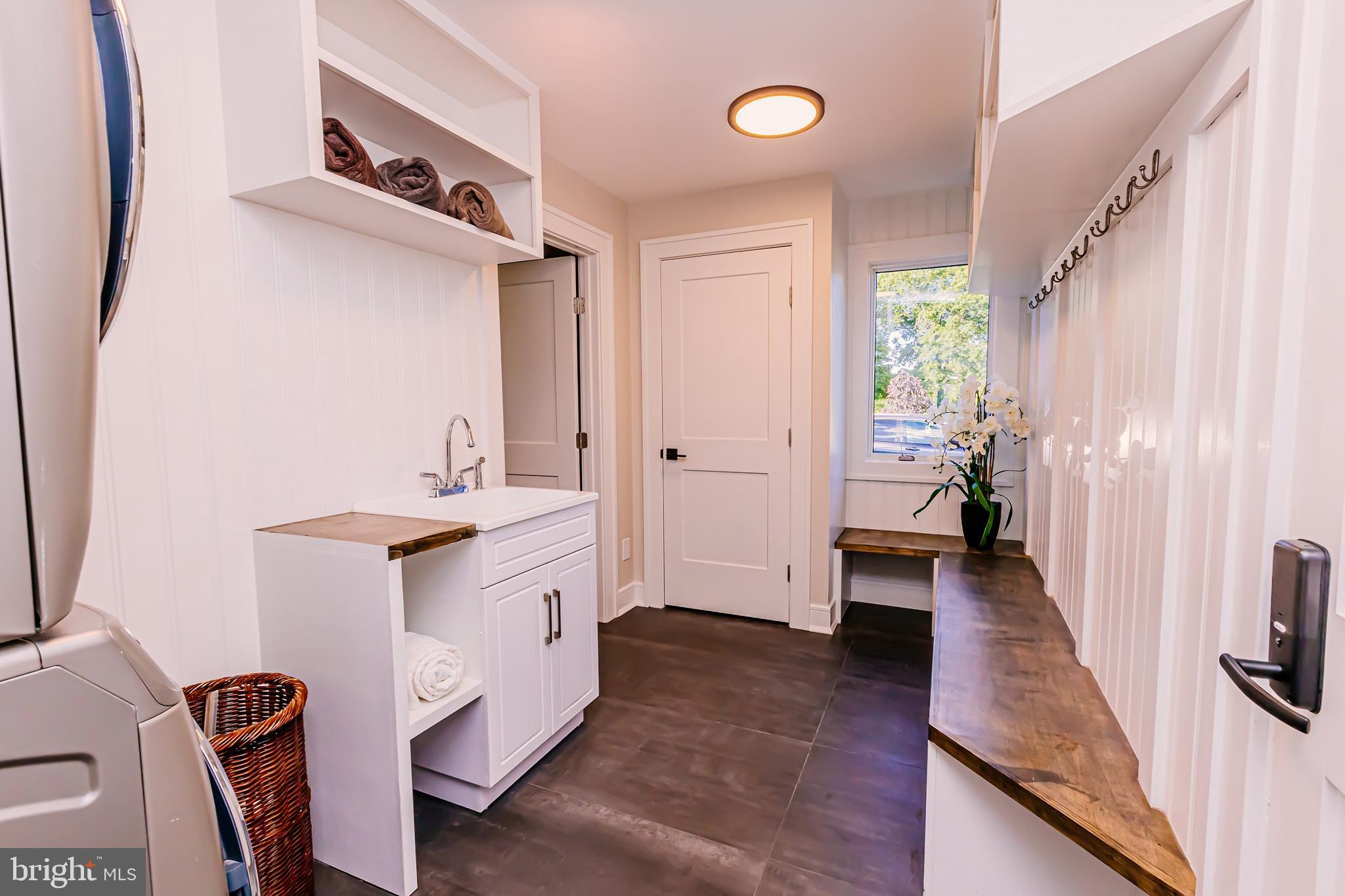 1091 Highland Road Newtown, PA 18940 - Photo 59 of 128 a bathroom with a sink a mirror and a toilet