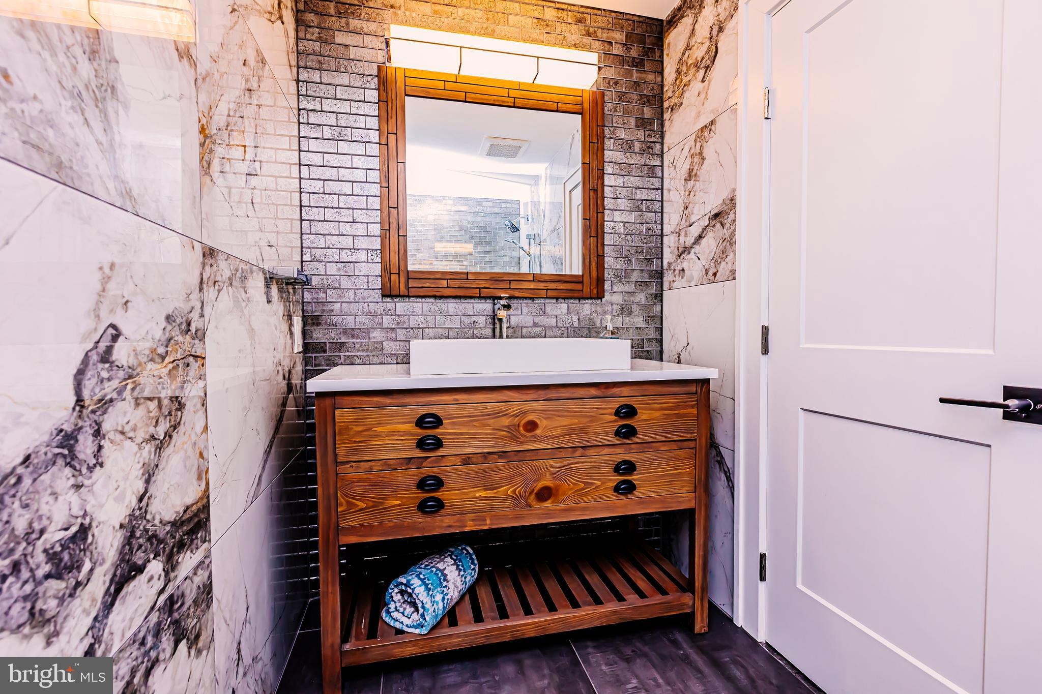 1091 Highland Road Newtown, PA 18940 - Photo 63 of 128 European crafted marble tiles (Hall Bathroom)