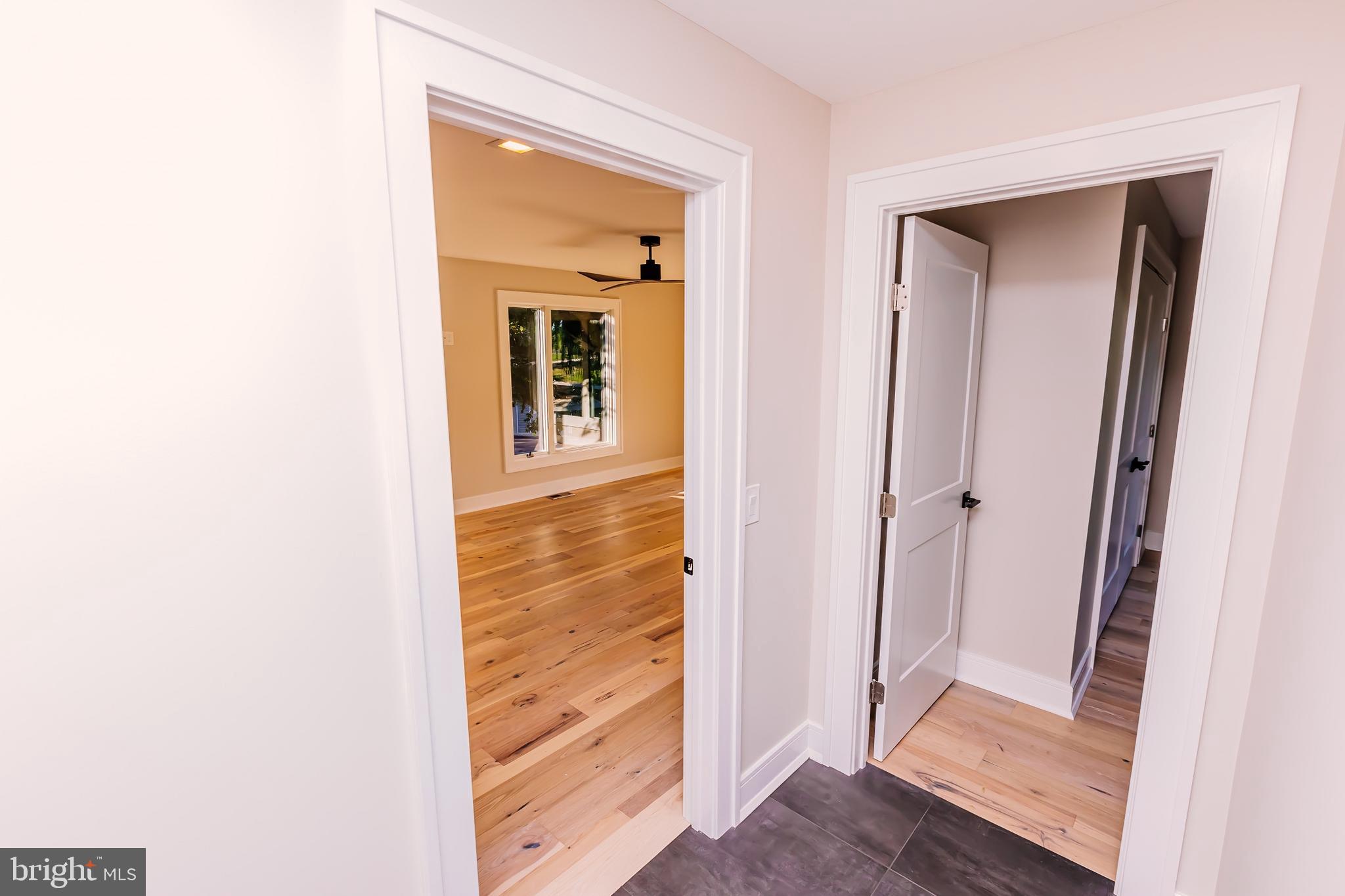 1091 Highland Road Newtown, PA 18940 - Photo 85 of 128 a view of a bathroom from a hallway