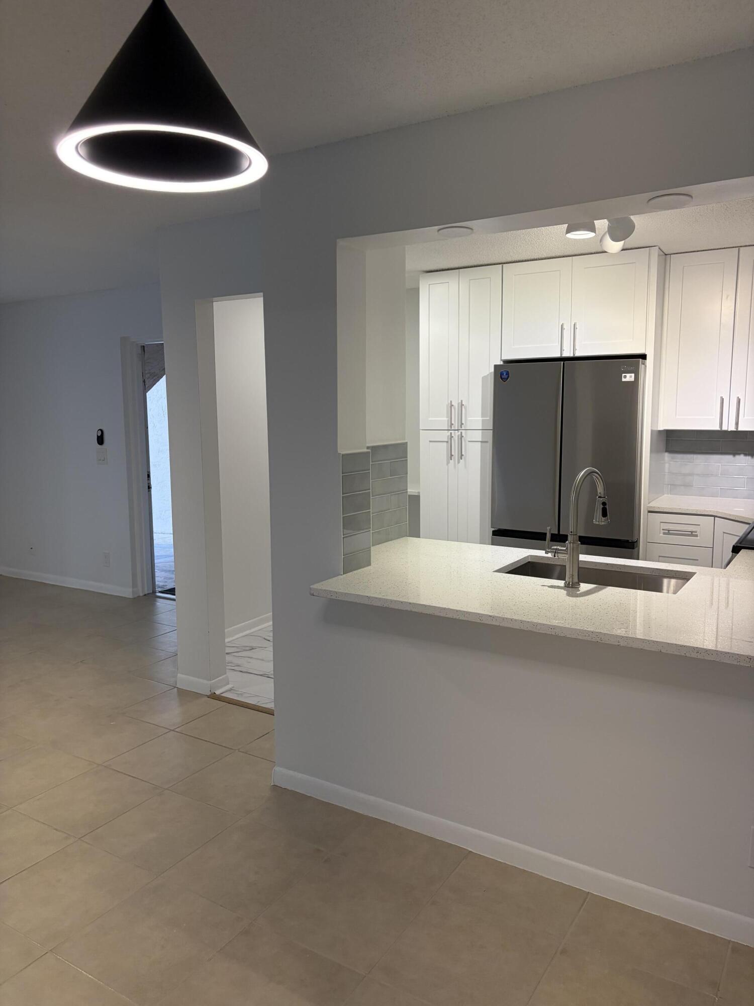 13811 Oneida Drive, Unit E1 Delray Beach, FL 33446 - Photo 2 of 26 IMG_0707