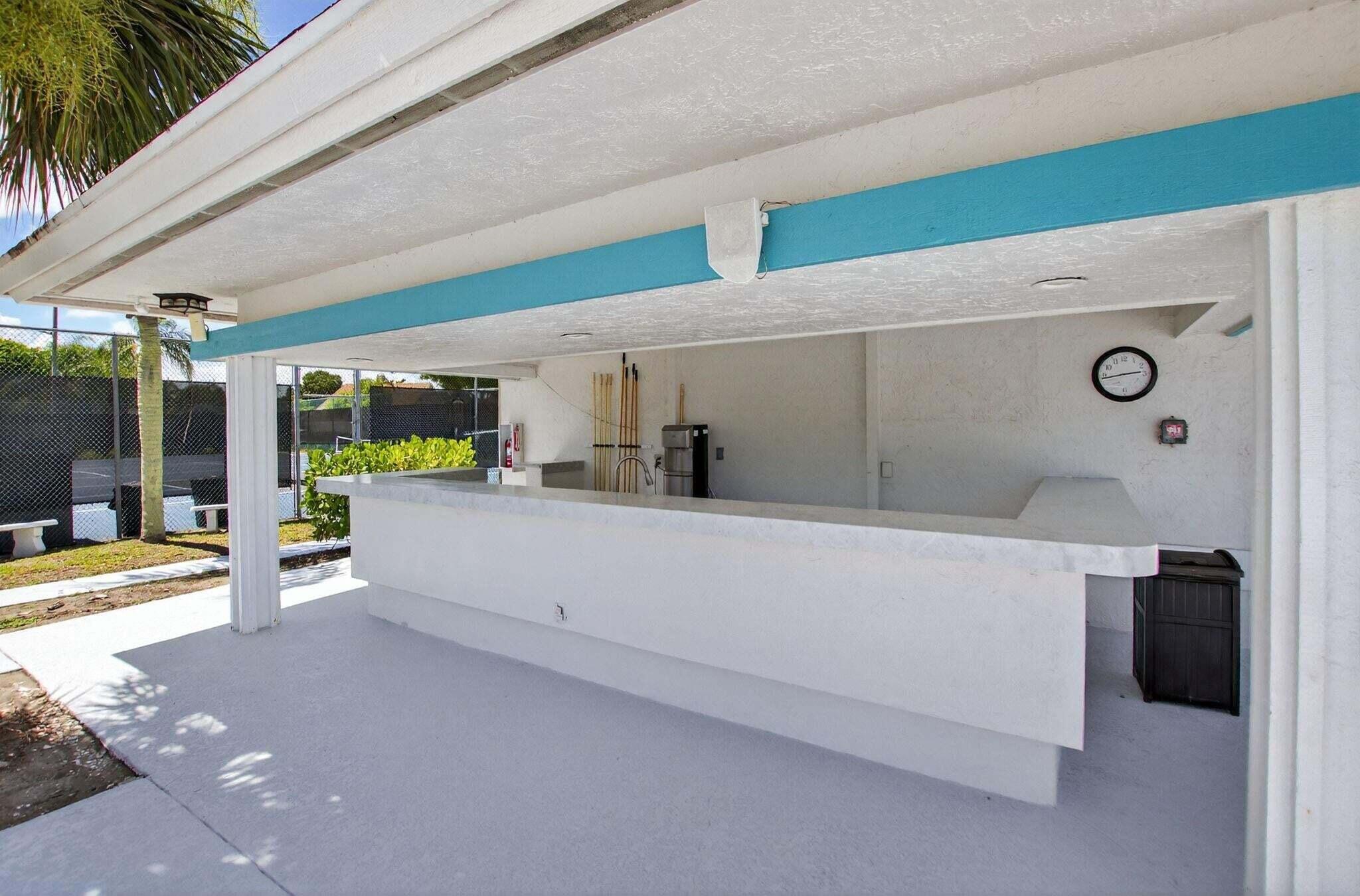 13811 Oneida Drive, Unit E1 Delray Beach, FL 33446 - Photo 23 of 26 pineridgeoutsidebar