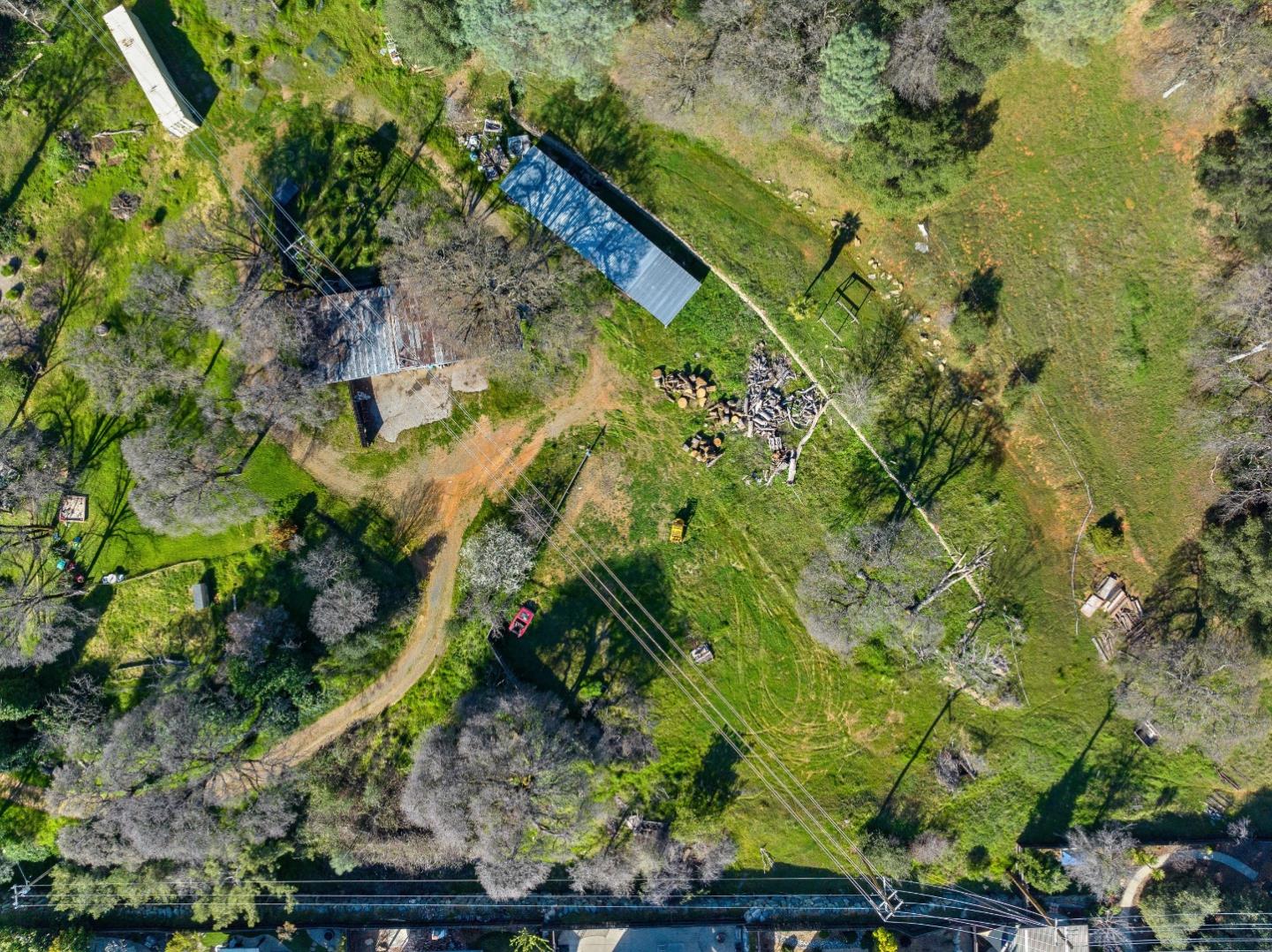 10264 Combie Road Grass Valley, CA 95949 - Photo 17 of 53 a view of a garden