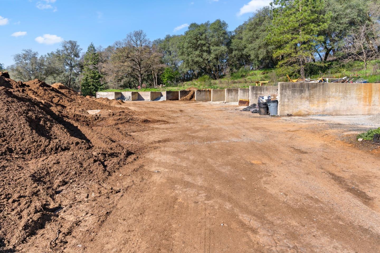 10264 Combie Road Grass Valley, CA 95949 - Photo 29 of 53 a view of house with outdoor space and trees in the background