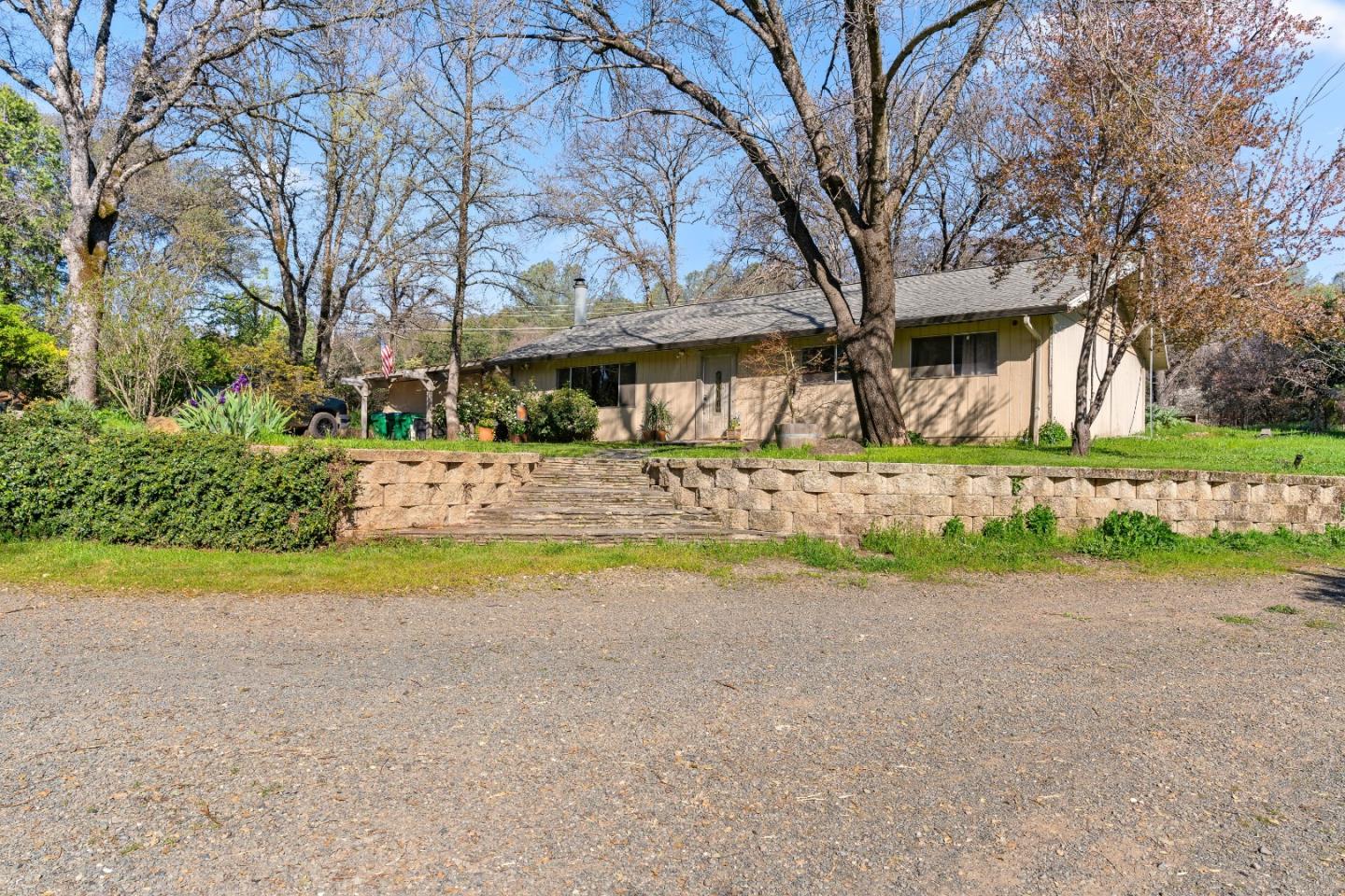 10264 Combie Road Grass Valley, CA 95949 - Photo 30 of 53 a view of road with large trees and cars parked