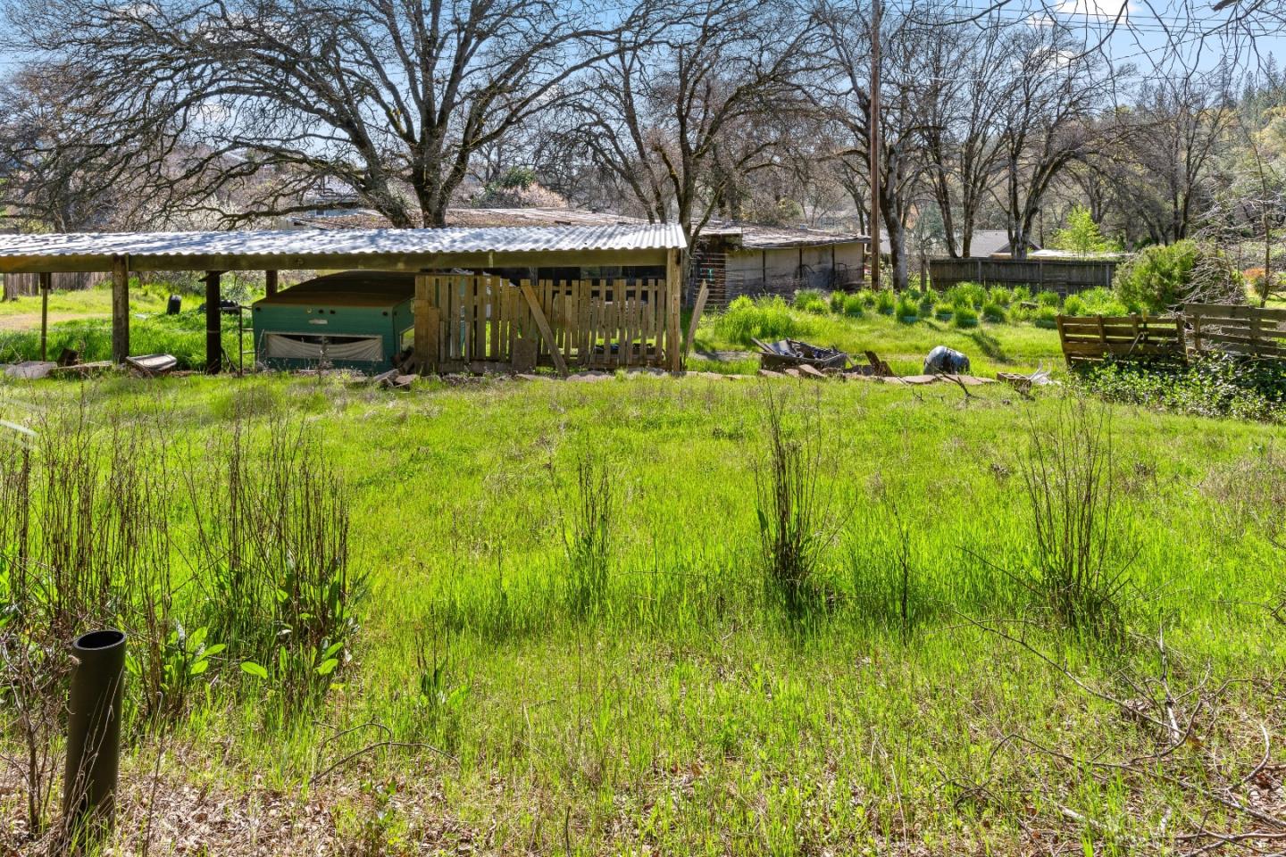 10264 Combie Road Grass Valley, CA 95949 - Photo 44 of 53 a front view of a house with garden