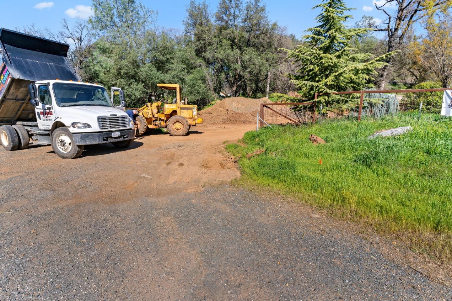 10264 Combie Road Grass Valley, CA 95949 - Photo 46 of 53 a view of a backyard with table and chairs