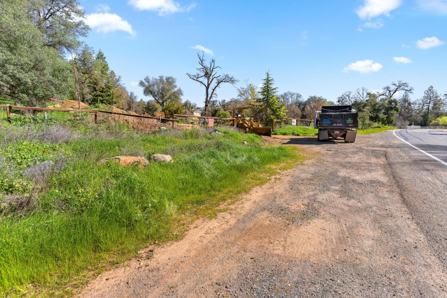 10264 Combie Road Grass Valley, CA 95949 - Photo 50 of 53 a front view of a house with a yard and lake view