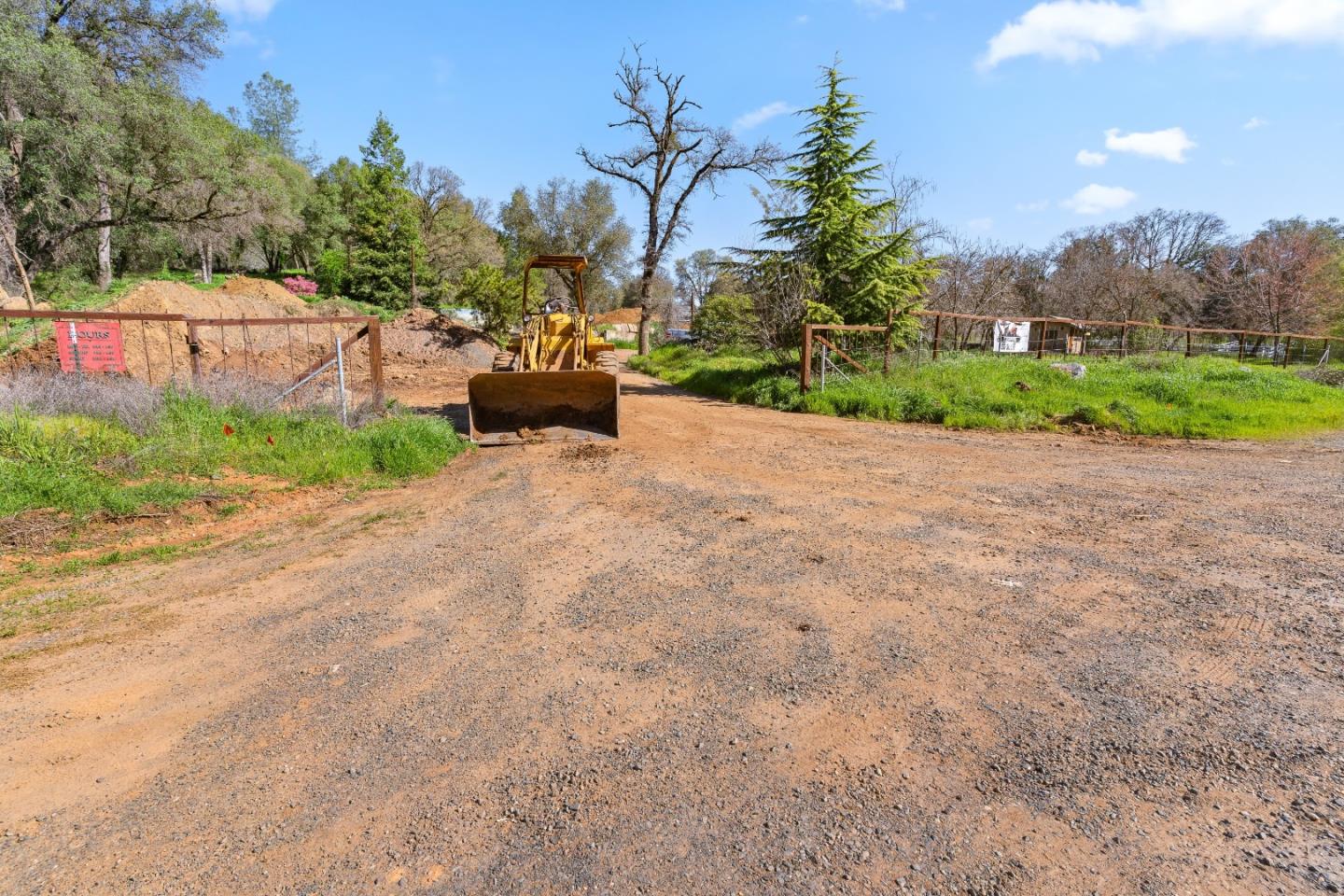 10264 Combie Road Grass Valley, CA 95949 - Photo 51 of 53 a backyard of a house with a garden and mountain view