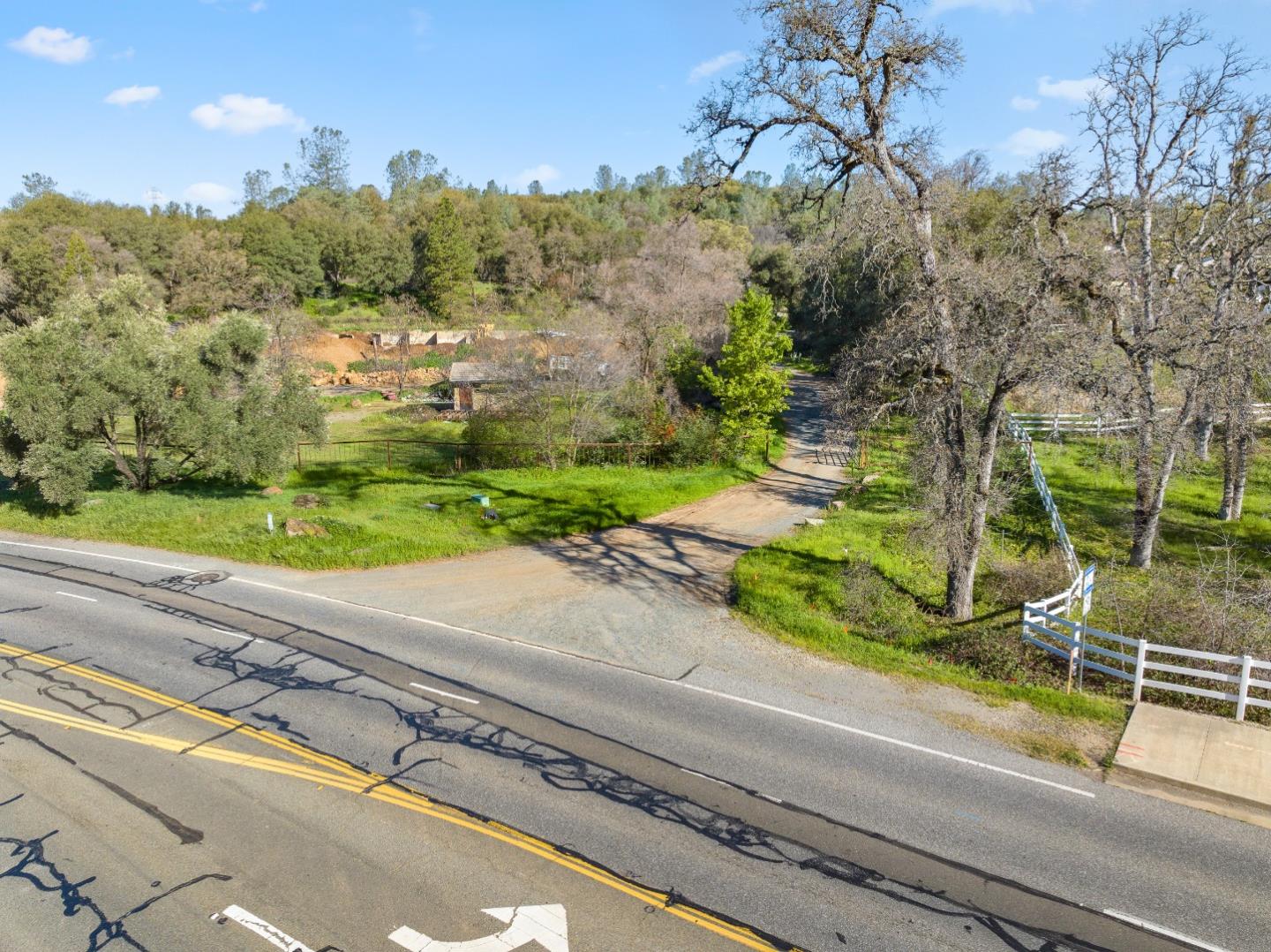 10264 Combie Road Grass Valley, CA 95949 - Photo 6 of 53 a view of a street with a houses