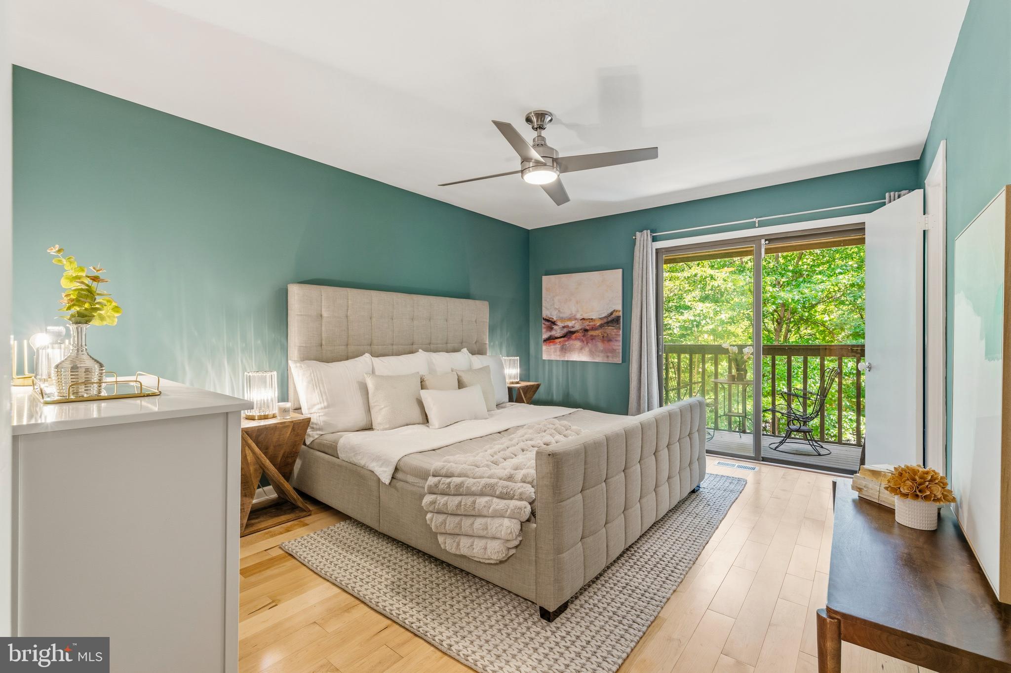 1953 Winterport Cluster Reston, VA 20191 - Photo 2 of 2 Primary Suite w/ Private Balcony Overlooking Trees