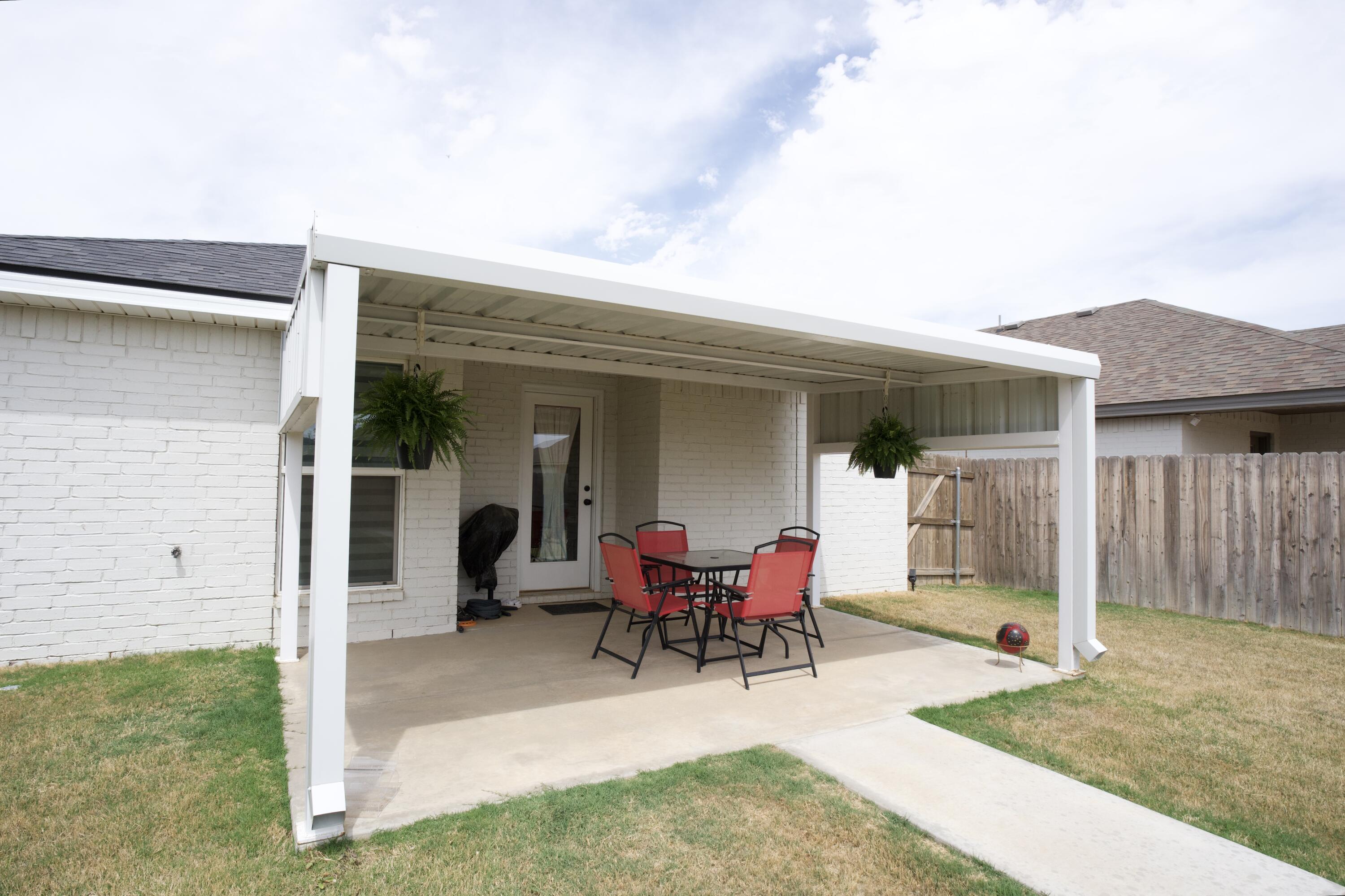 1913 134th Street Lubbock, TX 79423 - Photo 14 of 15 a view of a house with patio