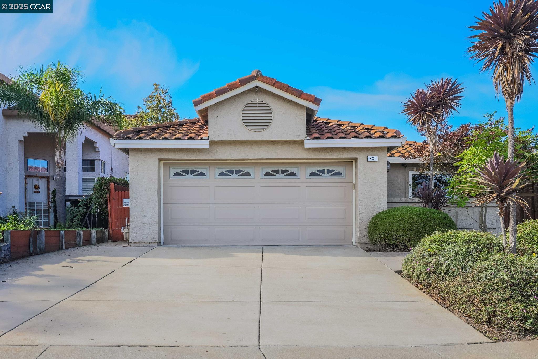 a view of a house with a garage and a garage