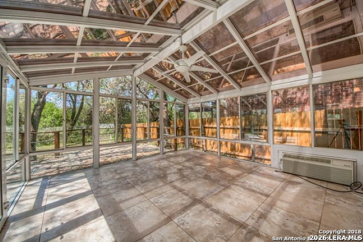 6911 Ridge Pl Street San Antonio, TX 78250 - Photo 21 of 22 a view of empty room with wooden floor