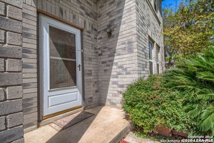 6911 Ridge Pl Street San Antonio, TX 78250 - Photo 4 of 22 a view of house with backyard