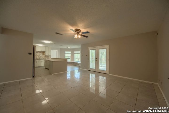 6911 Ridge Pl Street San Antonio, TX 78250 - Photo 9 of 22 a view of a livingroom with a kitchen