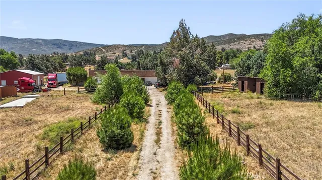 a view of a houses with a yard