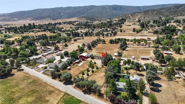 an aerial view of residential houses and city street