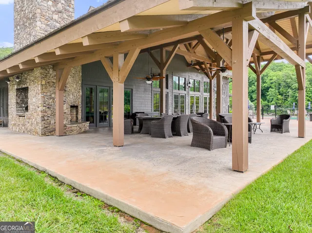 a view of a back yard with a fountain