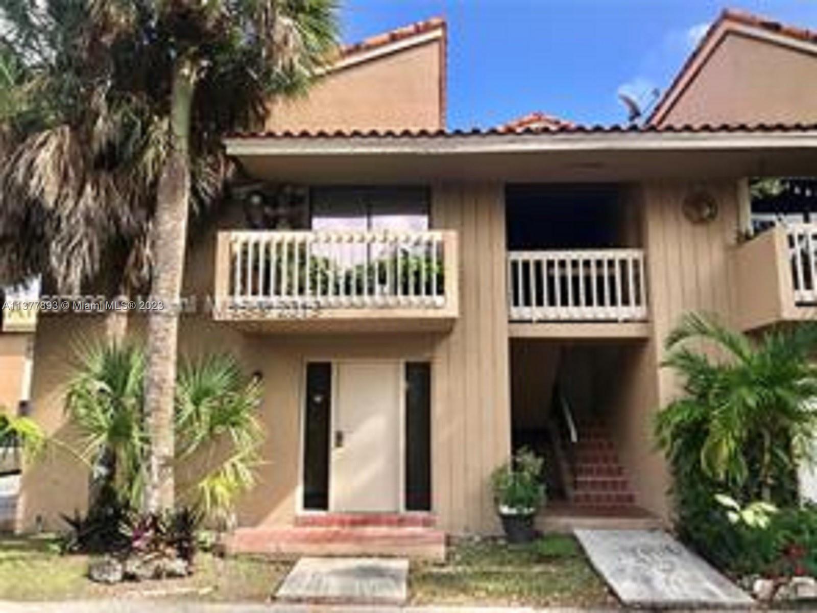a front view of a house with a porch
