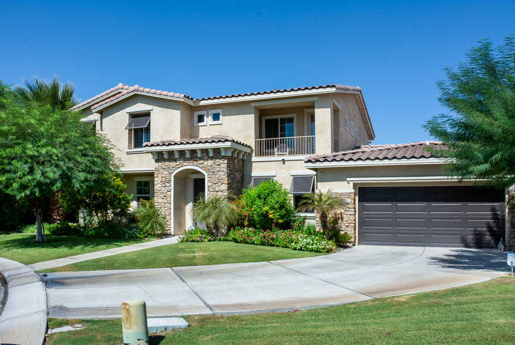 83460 Lone Star Road Indio, CA 92203 - Photo 1 of 40 a front view of house with yard and green space