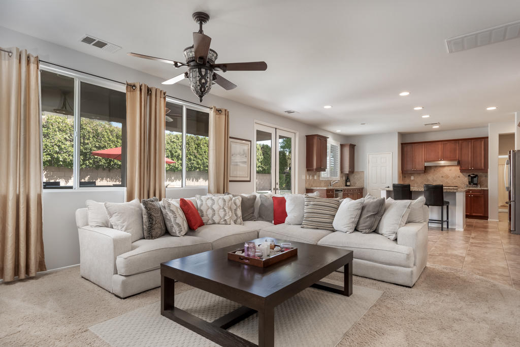 83460 Lone Star Road Indio, CA 92203 - Photo 12 of 40 a living room with furniture and a large window