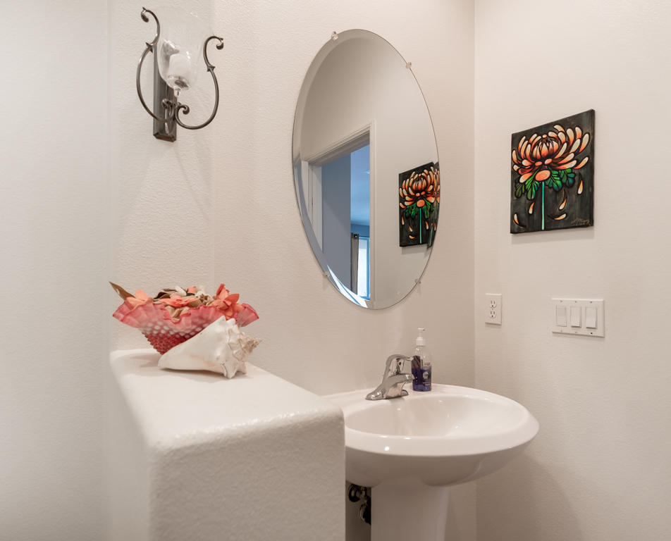 83460 Lone Star Road Indio, CA 92203 - Photo 13 of 40 a bathroom with a sink and a mirror