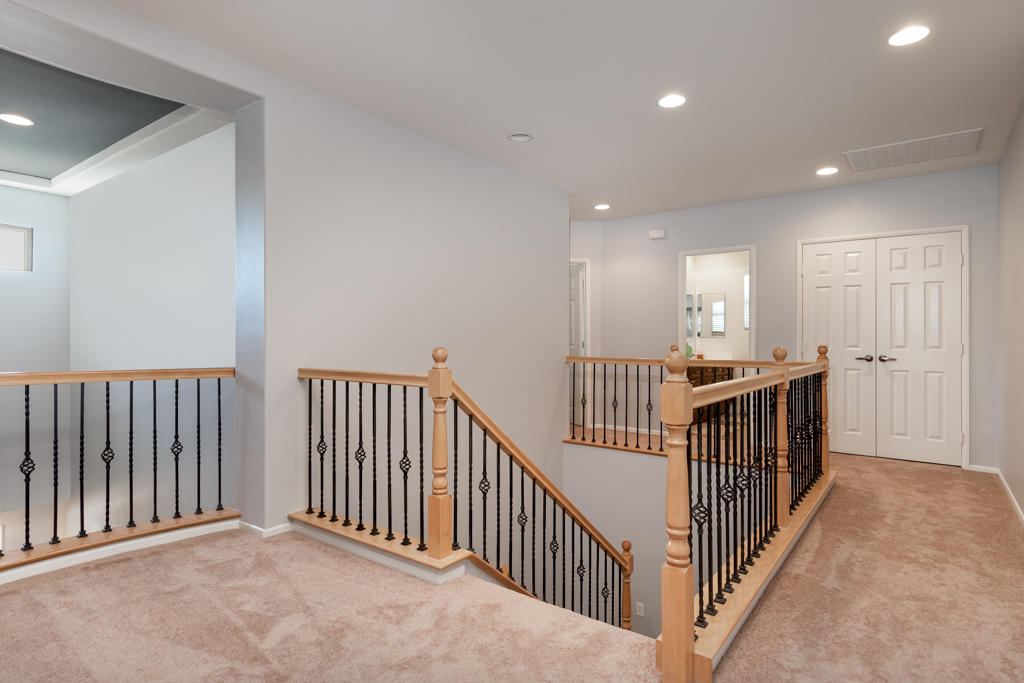 83460 Lone Star Road Indio, CA 92203 - Photo 17 of 40 a view of a hallway with a livingroom