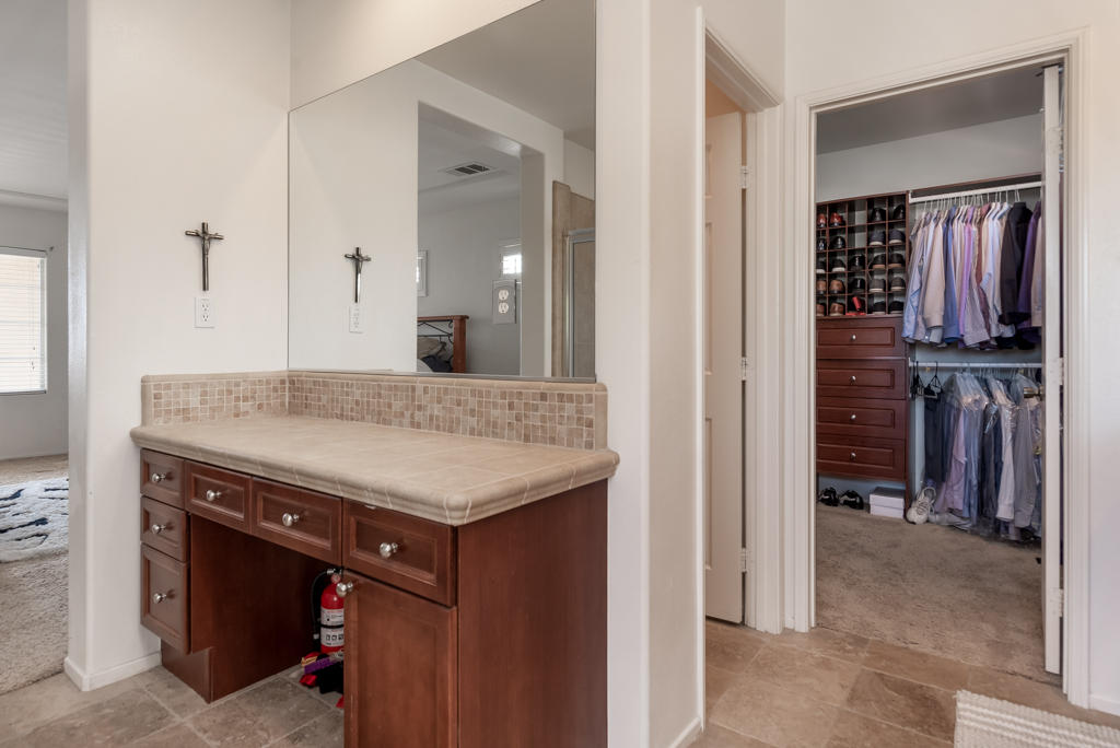 83460 Lone Star Road Indio, CA 92203 - Photo 24 of 40 a bathroom with a granite countertop sink and a mirror